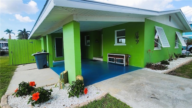 view of patio / terrace with a carport