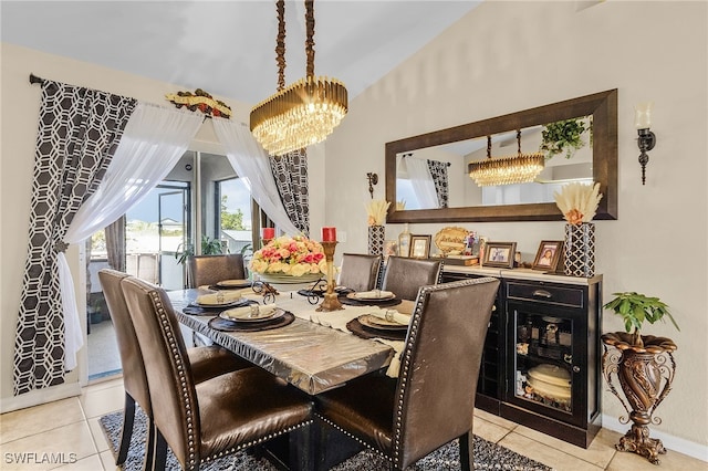 tiled dining space featuring an inviting chandelier