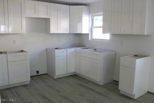 16881 Davis Rd Unit 712, Fort Myers, FL 33908 - washroom with light hardwood / wood-style flooring