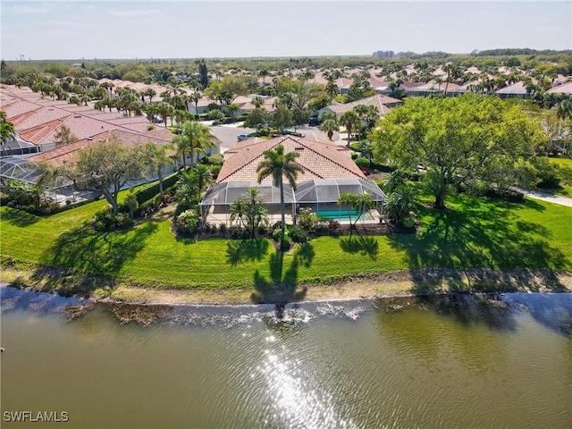 bird's eye view with a water view and a residential view