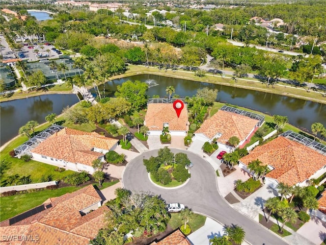 drone / aerial view featuring a water view