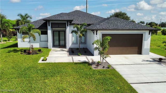 view of front facade featuring a garage and a front yard