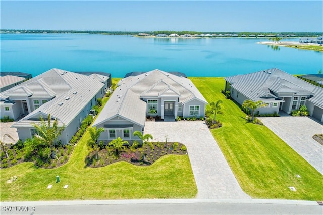 drone / aerial view with a water view