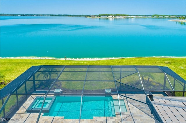 exterior space featuring a water view and glass enclosure