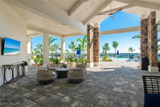 view of patio with a community pool