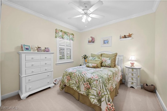 bedroom featuring crown molding, ceiling fan, and light carpet