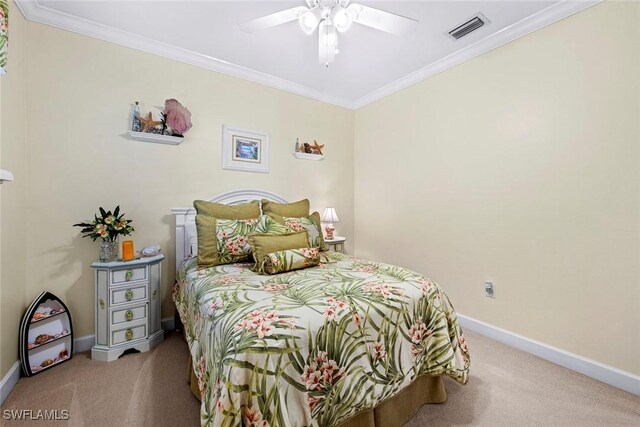 bedroom featuring ceiling fan, ornamental molding, and light carpet