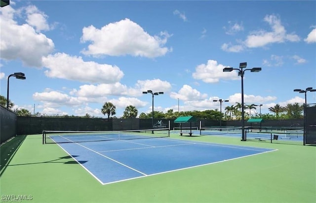 view of sport court featuring basketball hoop