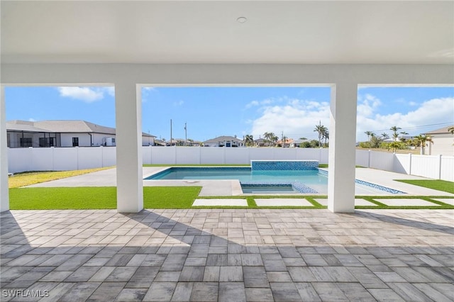 view of swimming pool featuring a patio