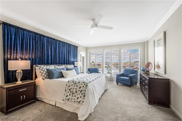 bedroom with crown molding, ceiling fan, and light carpet