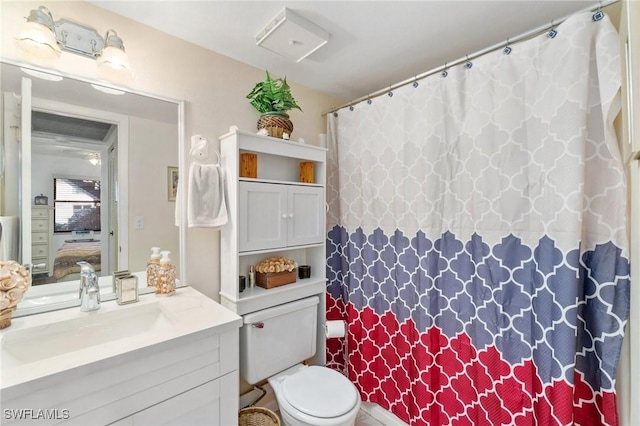 ensuite bathroom with vanity, ensuite bath, toilet, and a shower with shower curtain