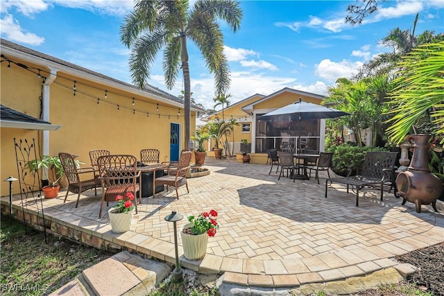 view of patio featuring a fire pit