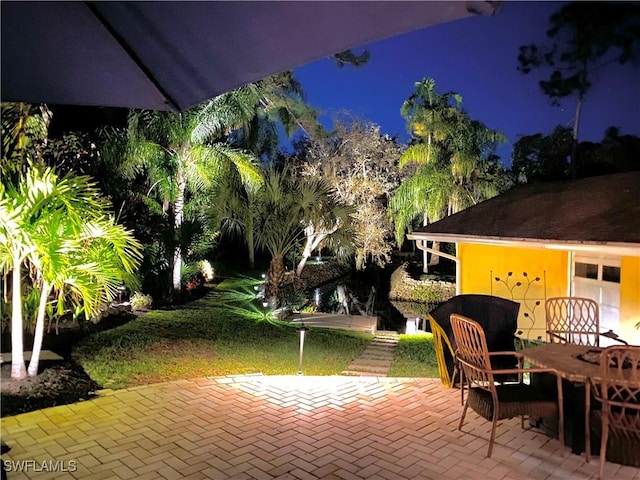 view of patio at twilight