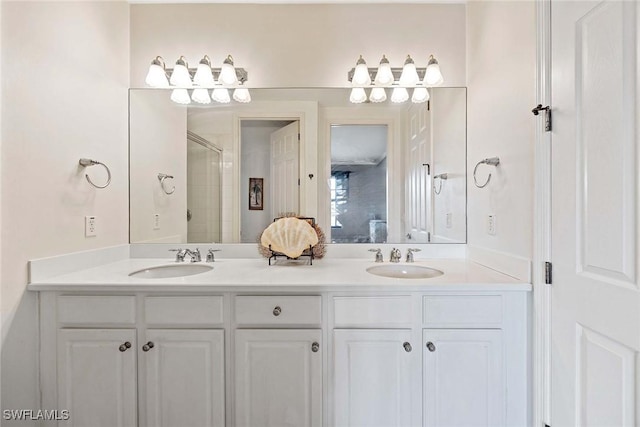 bathroom featuring walk in shower and vanity