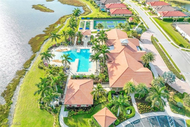 birds eye view of property featuring a water view