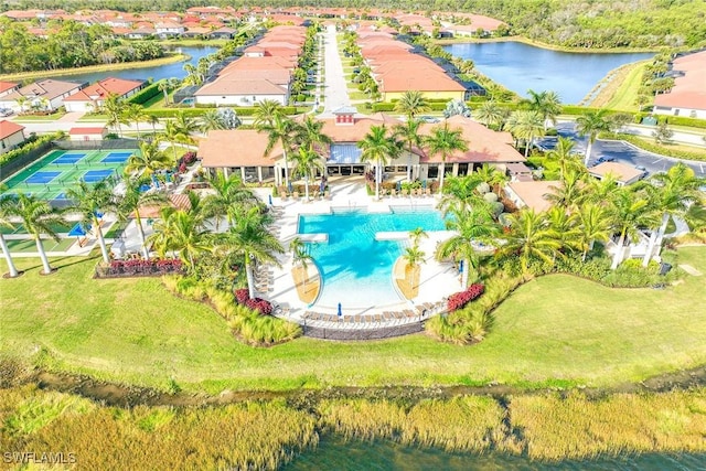 birds eye view of property featuring a water view