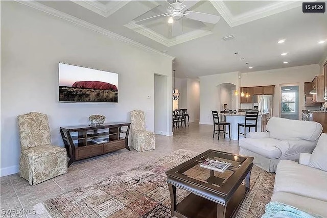 living room featuring ornamental molding, ceiling fan, beamed ceiling, and coffered ceiling