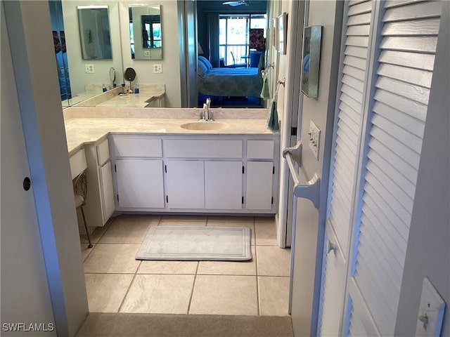 bathroom with vanity and tile patterned flooring