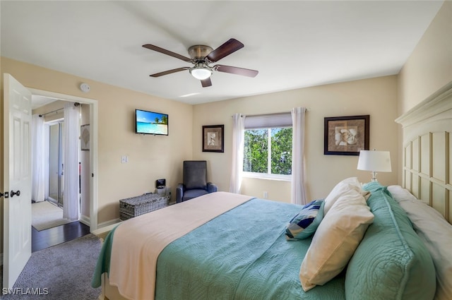 bedroom featuring hardwood / wood-style floors and ceiling fan