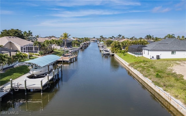 view of dock featuring a water view and glass enclosure