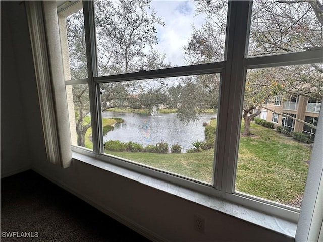 interior details featuring a water view