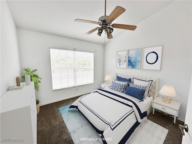 carpeted bedroom with ceiling fan and lofted ceiling