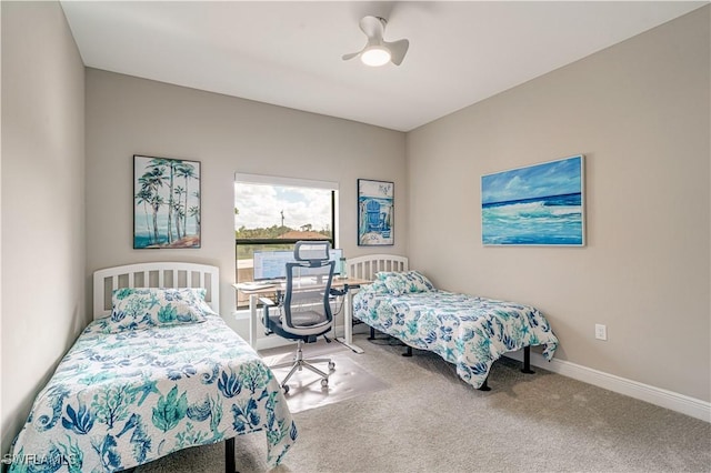 bedroom featuring ceiling fan and carpet flooring