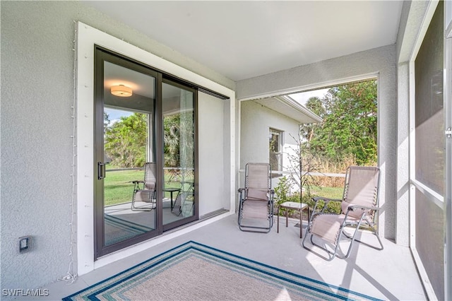 sunroom featuring plenty of natural light