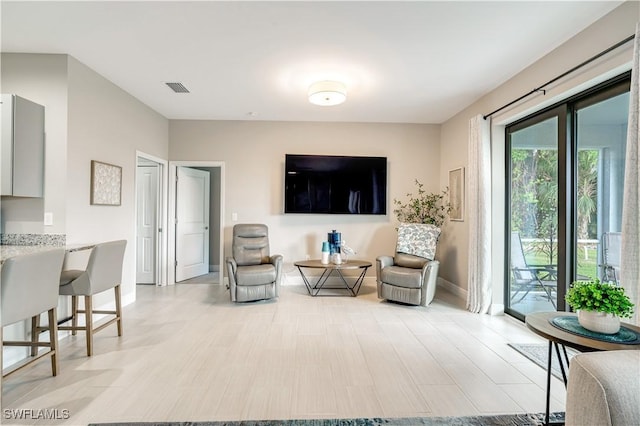 living room featuring light hardwood / wood-style floors