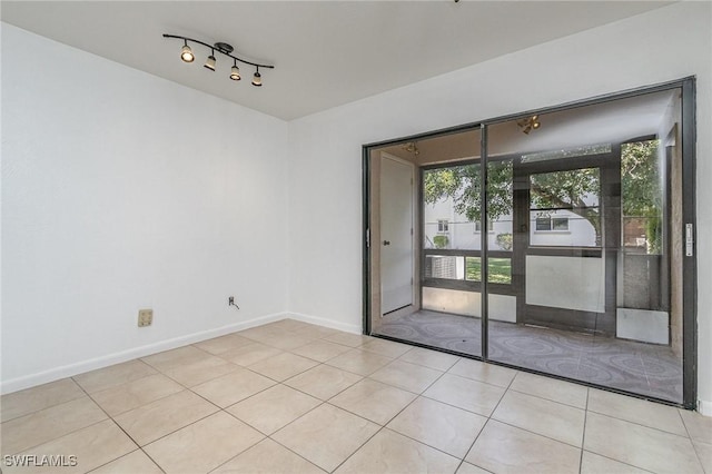 view of tiled spare room