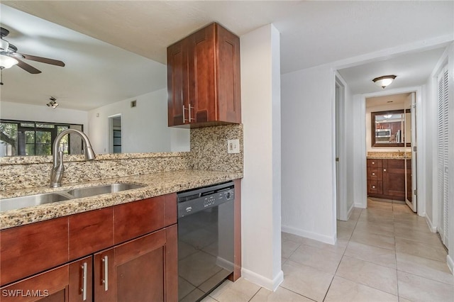 kitchen featuring light tile patterned flooring, black dishwasher, sink, decorative backsplash, and light stone counters