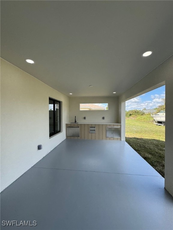 view of patio featuring exterior kitchen