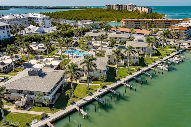 birds eye view of property featuring a water view