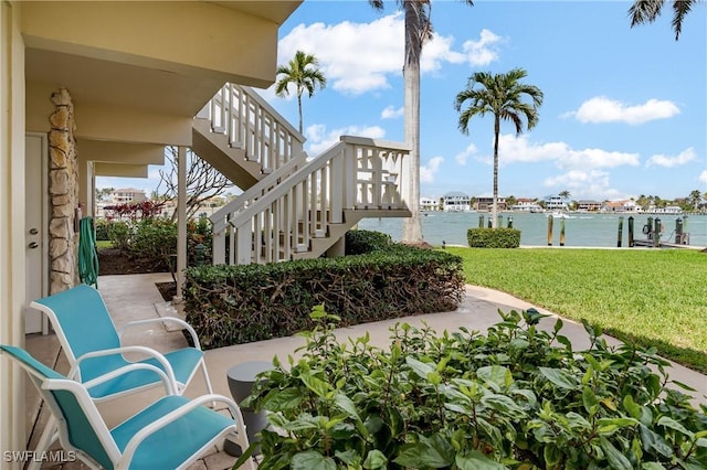 view of patio / terrace with a water view