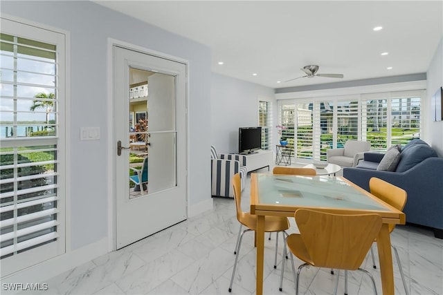 dining area with ceiling fan