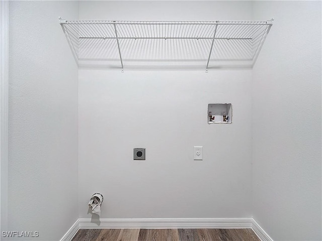 laundry room with hardwood / wood-style flooring, washer hookup, and electric dryer hookup