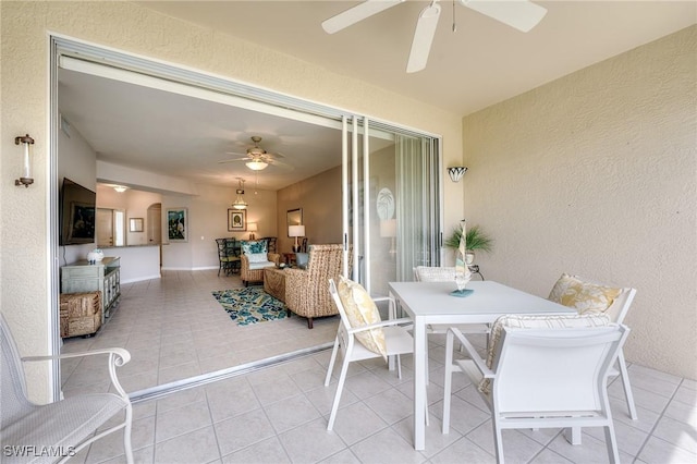 view of patio / terrace featuring a ceiling fan, outdoor dining area, and outdoor lounge area