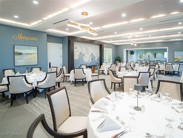 dining area featuring recessed lighting