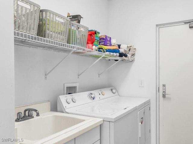 930 Cape Marco Dr Unit 806, Marco Island, FL 34145 - laundry room featuring sink and washing machine and clothes dryer