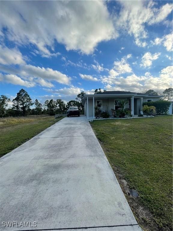 single story home with a front yard