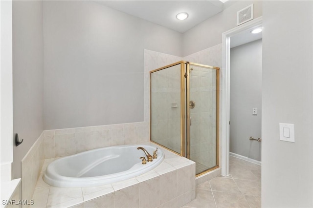 full bath featuring a bath, a shower stall, visible vents, and tile patterned floors