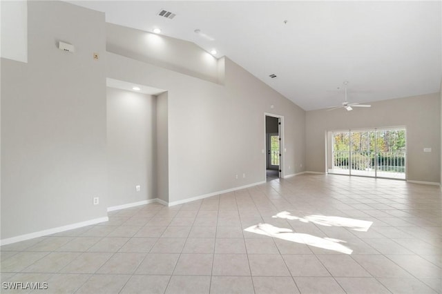 empty room featuring light tile patterned floors, high vaulted ceiling, visible vents, a ceiling fan, and baseboards