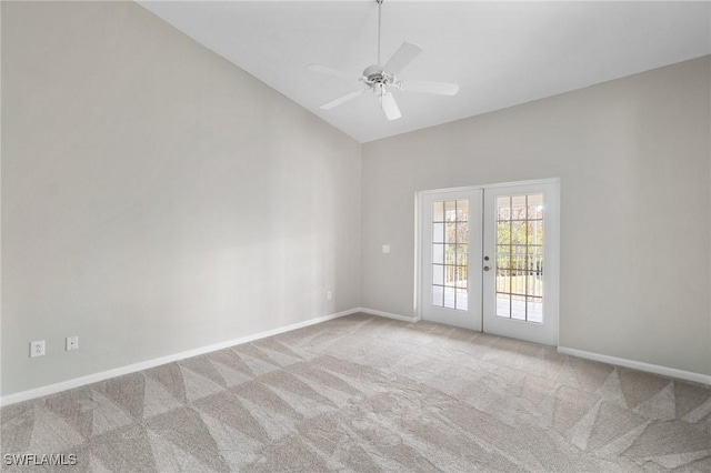 unfurnished room featuring french doors, light carpet, vaulted ceiling, ceiling fan, and baseboards