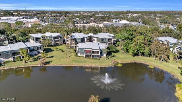 1724 Bald Eagle Dr Unit 512C, Naples, FL 34105 - drone / aerial view of a nearby body of water and a tree filled landscape
