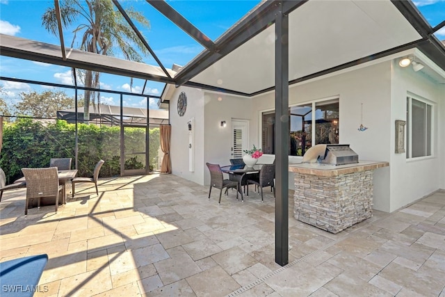 view of patio / terrace with outdoor dining area and area for grilling