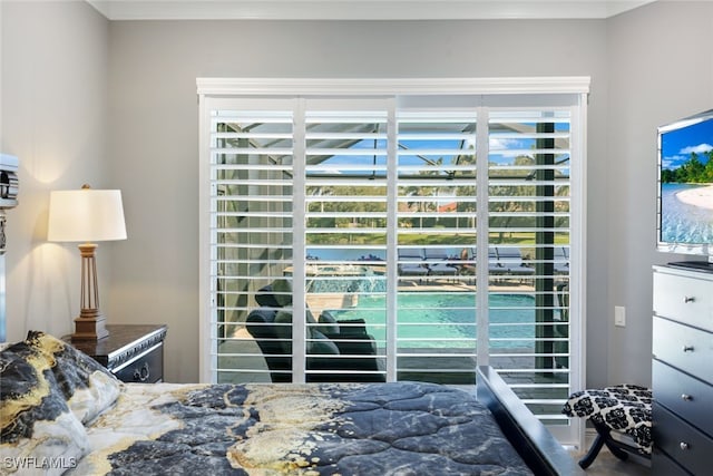 bedroom featuring multiple windows