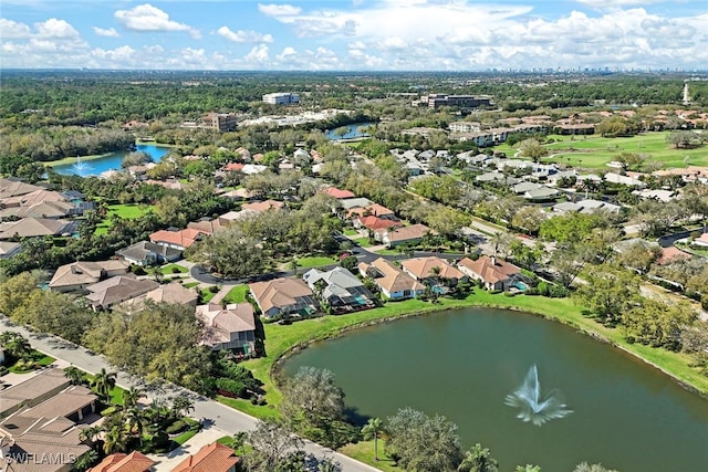 aerial view with a water view and a residential view