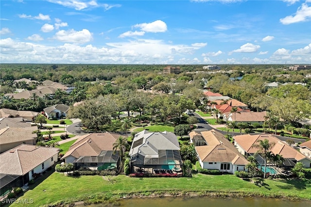 bird's eye view with a residential view and a water view