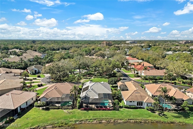 birds eye view of property with a residential view
