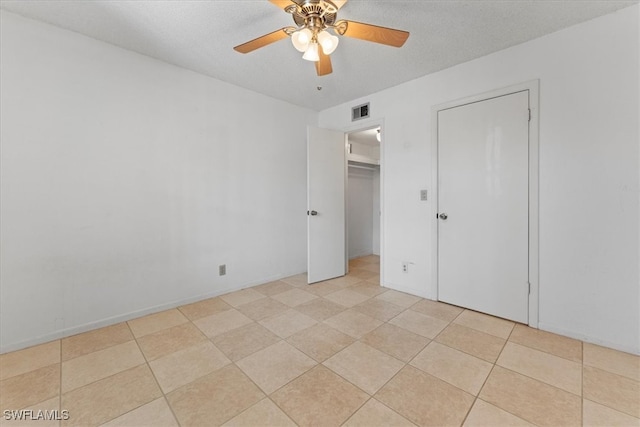 4345 27th Ct SW Unit 204, Naples, FL 34116 - unfurnished bedroom featuring a ceiling fan